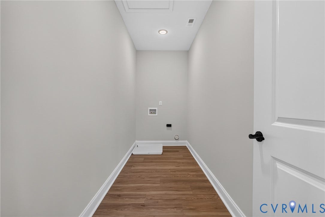 6549 Hardee Haven Place, Midlothian, VA 23112 Dedicated laundry area featuring wood-finish flooring, light gray walls, and a recessed ceiling light