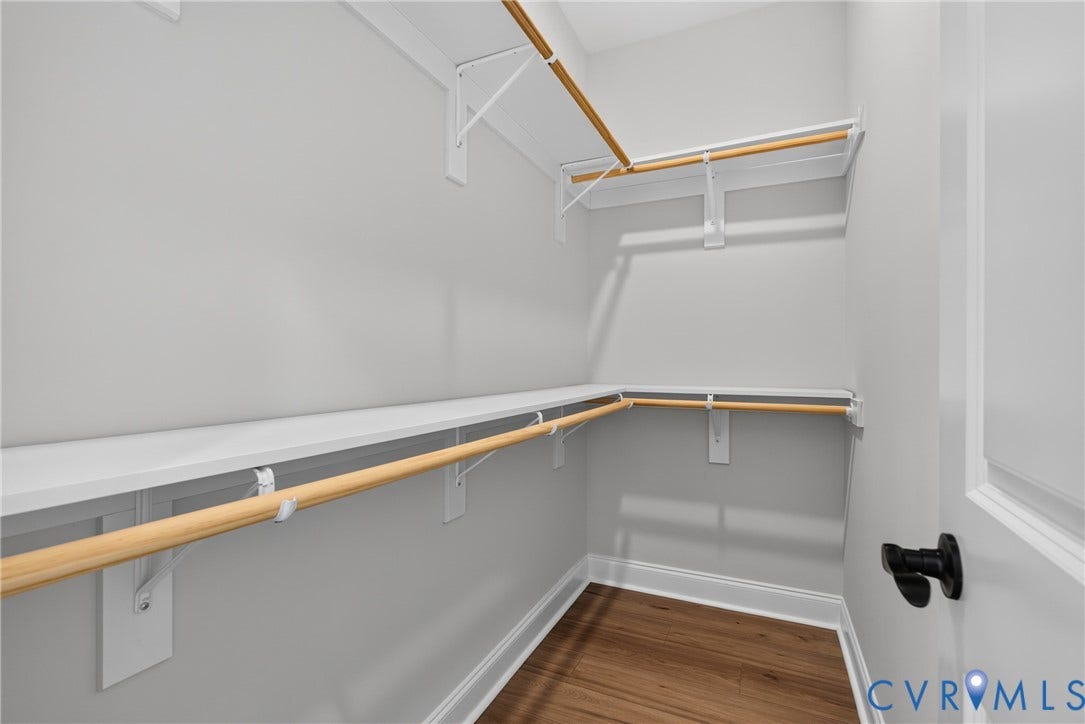 6549 Hardee Haven Place, Midlothian, VA 23112 Walk-in closet featuring white shelving, wood-finish hanging rods, and wood-finish flooring