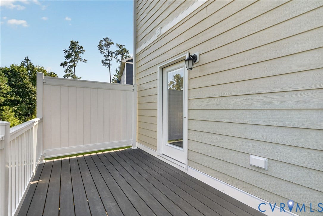6549 Hardee Haven Place, Midlothian, VA 23112 Outdoor deck featuring composite decking, white railing, and a privacy panel