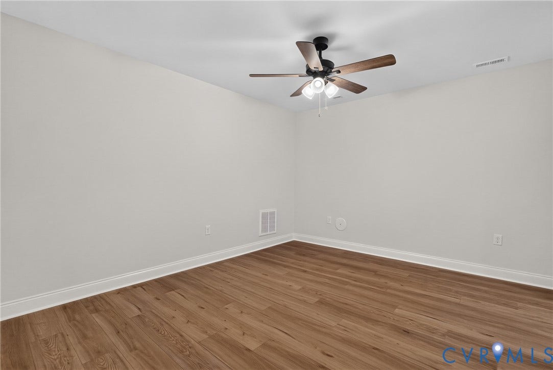 6549 Hardee Haven Place, Midlothian, VA 23112 Wood-finish flooring, light gray walls, and a ceiling fan with integrated lighting