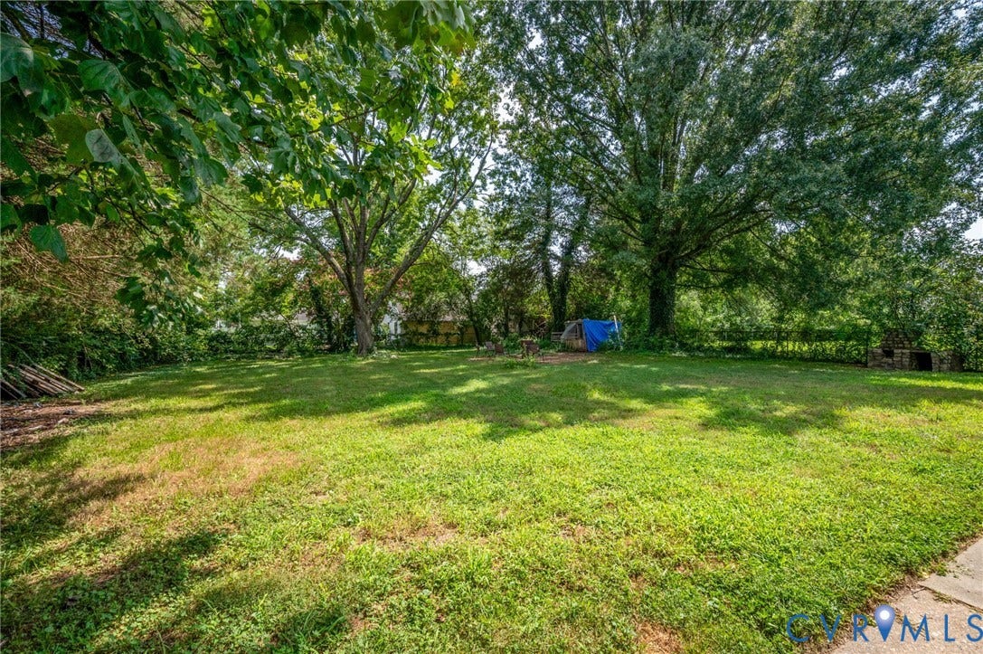 4819 Arundel Avenue, Chesterfield, VA 23234 Expansive grassy area with mature shade trees and a concrete edge