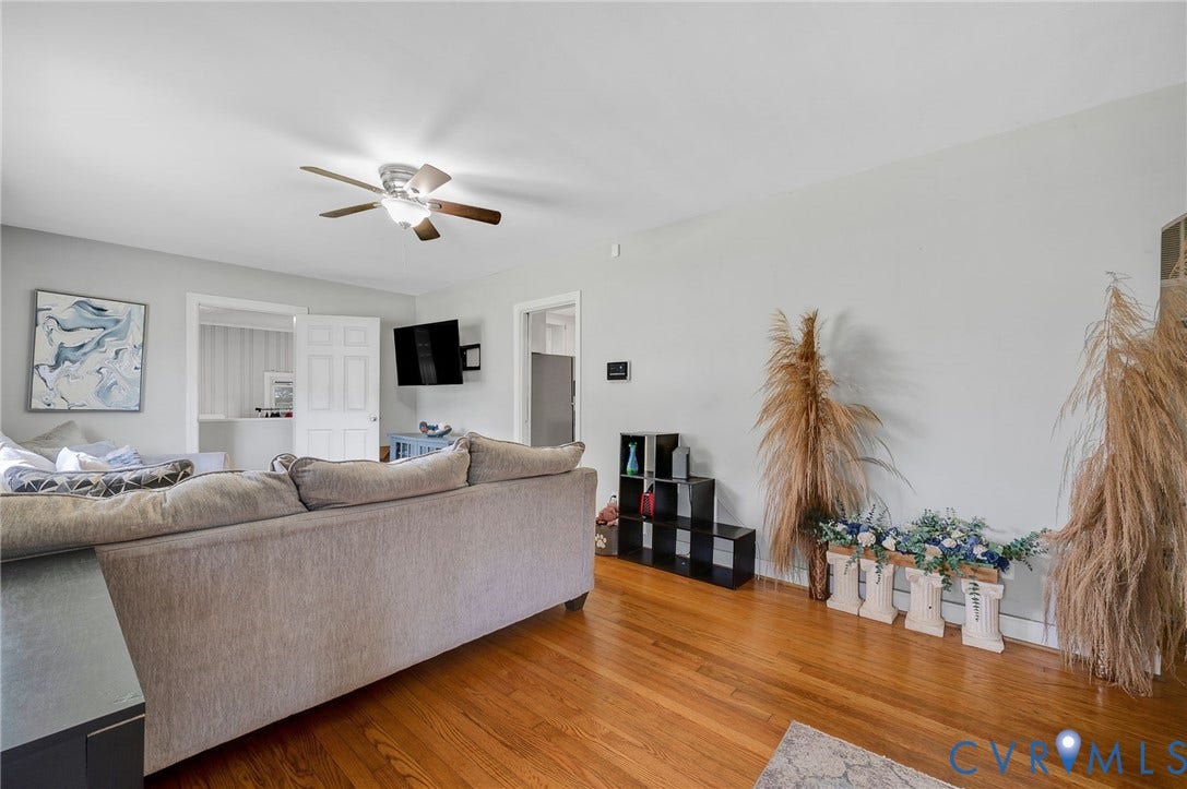 4819 Arundel Avenue, Chesterfield, VA 23234 Hardwood-finish flooring, ceiling fan with integrated lighting, and neutral wall tones