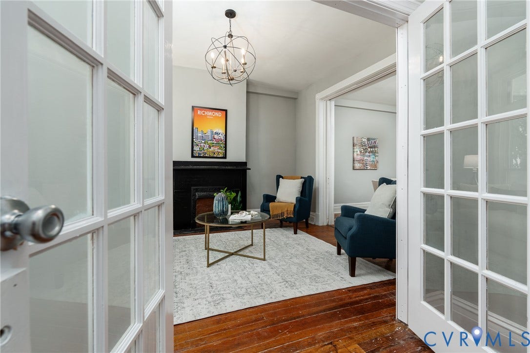 1906 W Main Street, Fan District, Richmond, VA 23220 Craftsman-style baseboards and window casings showcase timeless craftsmanship.