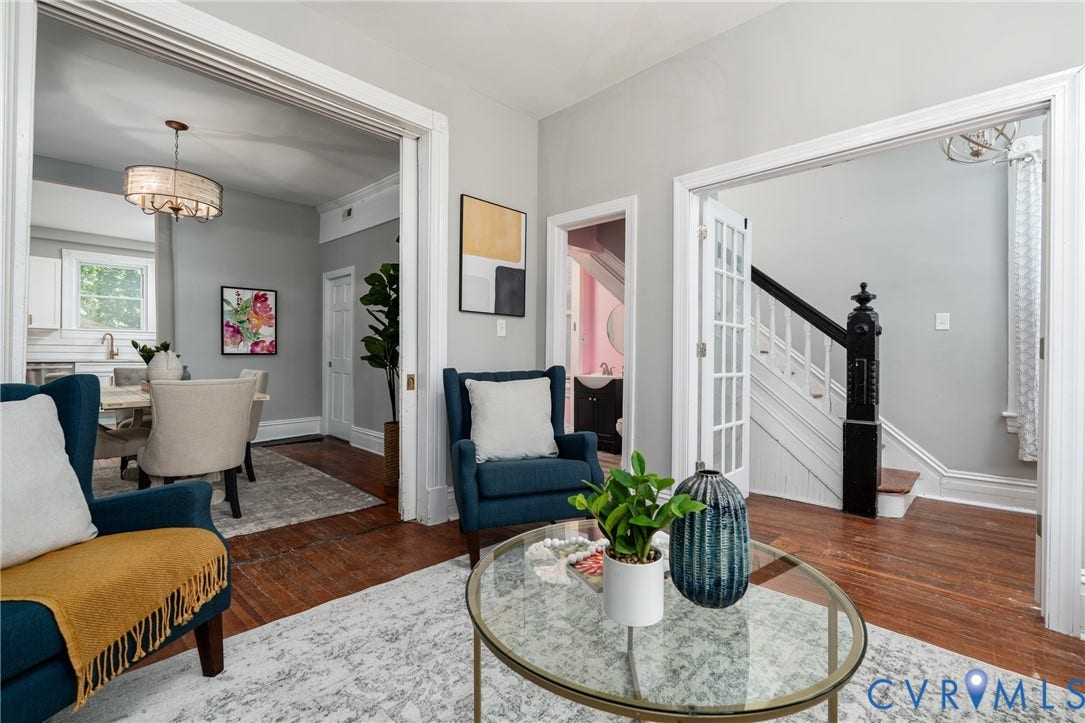 1906 W Main Street, Fan District, Richmond, VA 23220 Original pocket doors provide a beautiful connection between living spaces.