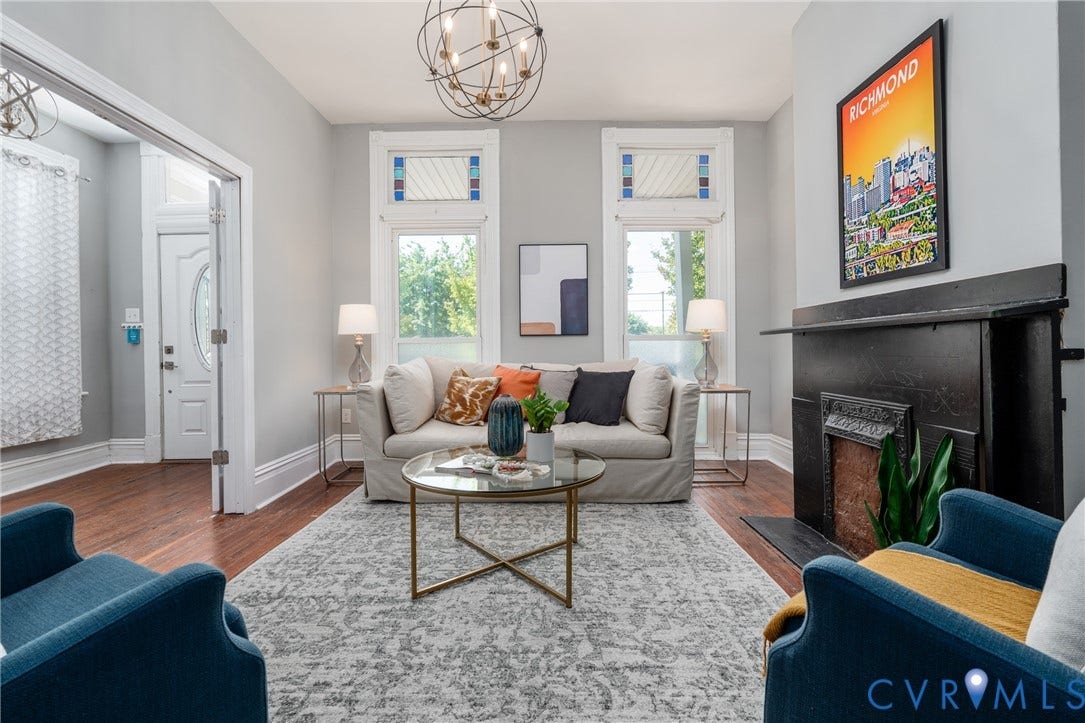 1906 W Main Street, Fan District, Richmond, VA 23220 Spacious first-floor living room with hardwood floors and soaring ceilings.