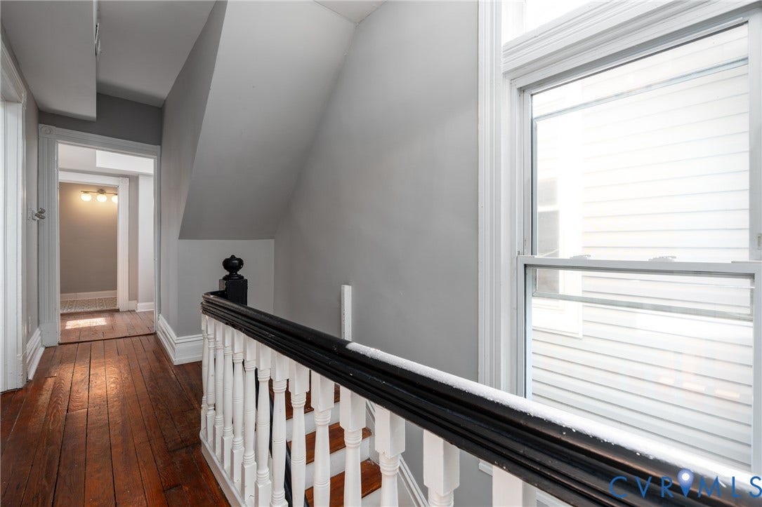 1906 W Main Street, Fan District, Richmond, VA 23220 Hallway to second floor bedroom, living space, and large laundry room.