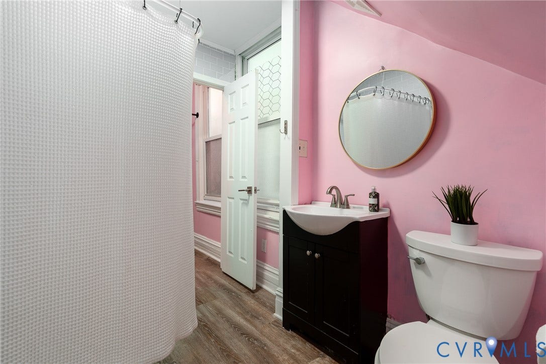 1906 W Main Street, Fan District, Richmond, VA 23220 Full bathroom on the first floor adds flexibility to the main living space.