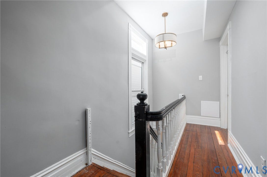 1906 W Main Street, Fan District, Richmond, VA 23220 Original staircase to second level living.