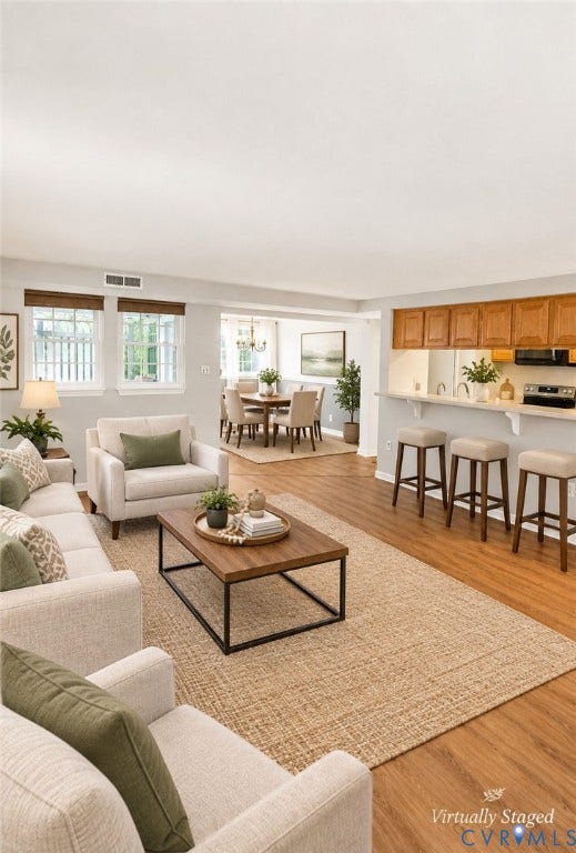 VIRTUALLY STAGED LIVING AND DINING AREA