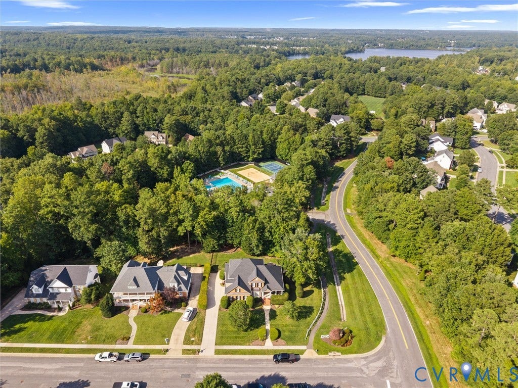 15706 Fox Marsh Drive, Moseley, VA 23120 Suburban setting with mature trees and a paved road