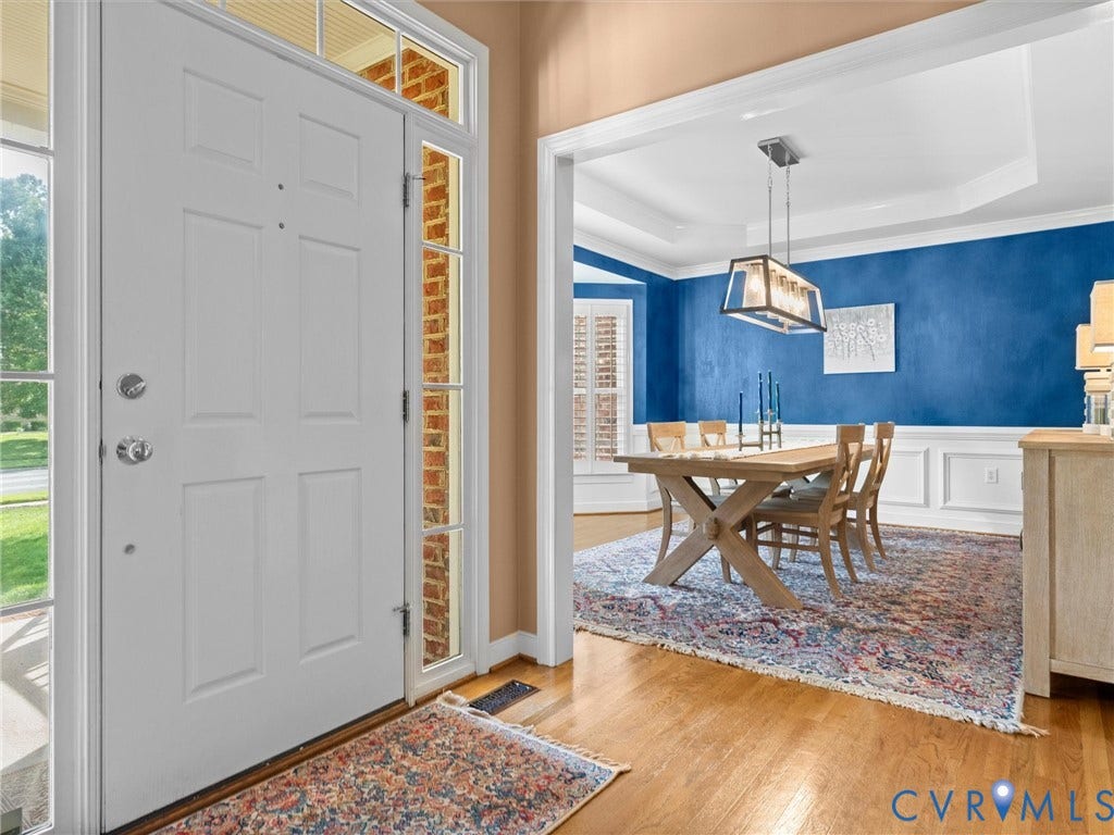 15706 Fox Marsh Drive, Moseley, VA 23120 Hardwood flooring, transom window, sidelight windows, tray ceiling, wainscoting