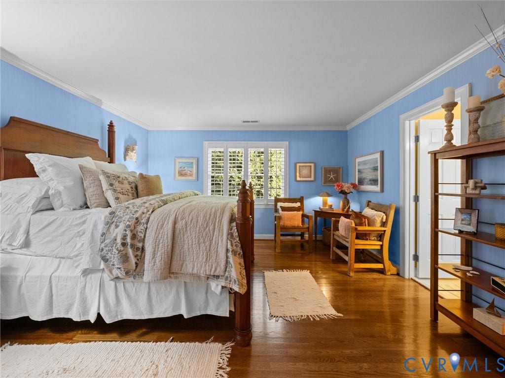 15706 Fox Marsh Drive, Moseley, VA 23120 Hardwood flooring, painted walls, crown molding, window with plantation shutters, built-in shelving