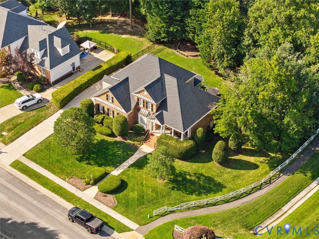 15706 Fox Marsh Drive, Moseley, VA 23120 Brick exterior with multiple gables and dormer windows