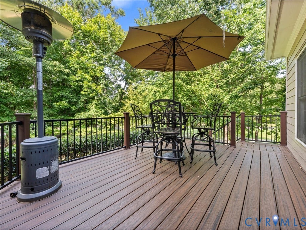 15706 Fox Marsh Drive, Moseley, VA 23120 Expansive outdoor deck with composite decking and black metal railings