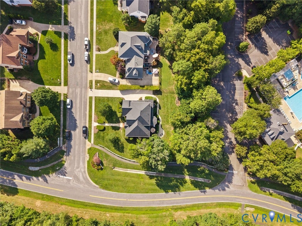 15706 Fox Marsh Drive, Moseley, VA 23120 Aerial perspective showcasing residential properties, paved roads, and landscaped grounds