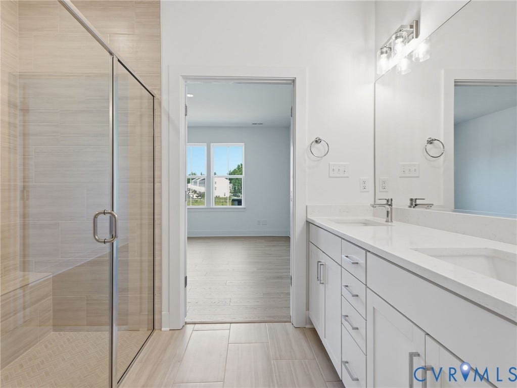 Primary Bathroom - Photo represents the actual home