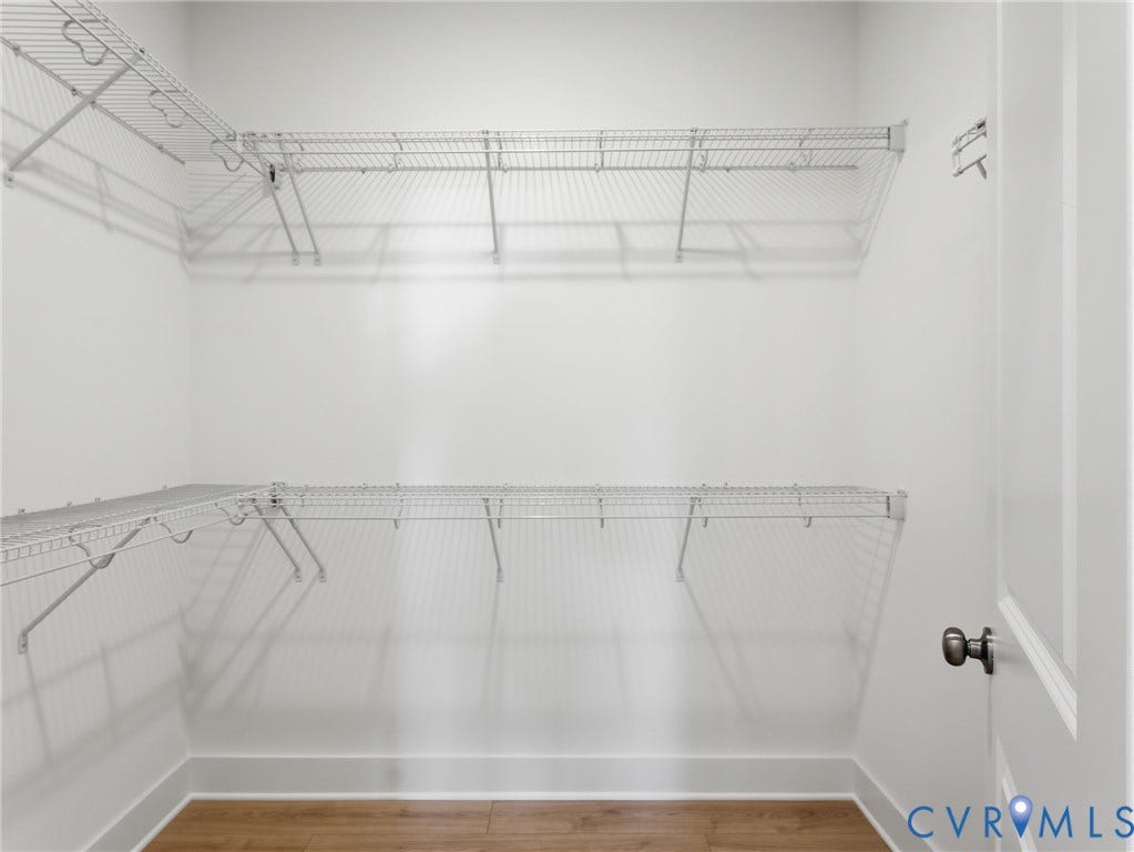 Primary Bedroom Closet - Photos represent the actual home
