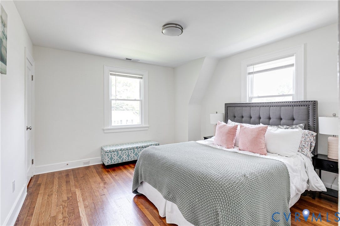 3215 Detroit Avenue, Richmond, VA 23222 Hardwood flooring, painted white walls, white window trim, and a flush-mount ceiling light fixture