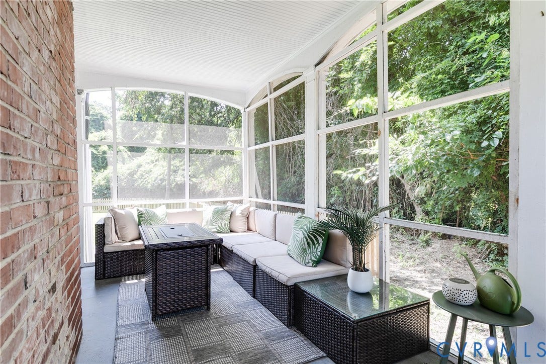 3215 Detroit Avenue, Richmond, VA 23222 Screened porch featuring exposed brick, an insulated ceiling, and multiple window panels