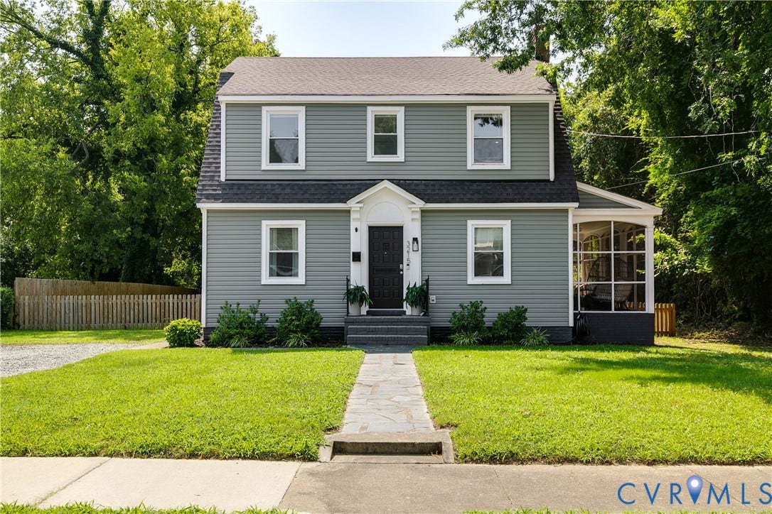 3215 Detroit Avenue, Richmond, VA 23222 Two-story residence with gray siding, white trim, and a dark shingle roof