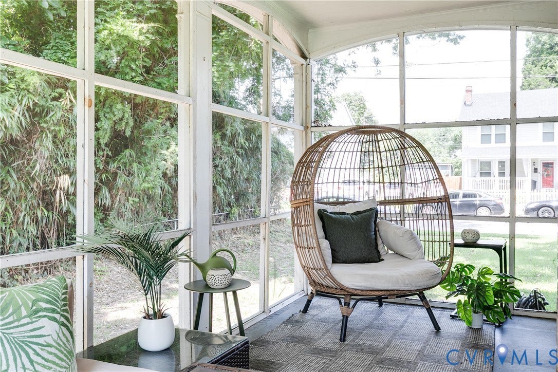 3215 Detroit Avenue, Richmond, VA 23222 Screened-in porch featuring white-framed windows, an arched ceiling, and geometric pattern flooring