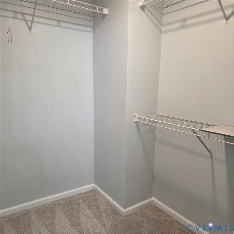 3241 Ransom Hills Road, Chesterfield, VA 23237 Carpeted closet space with wire shelving and light-toned wall paint