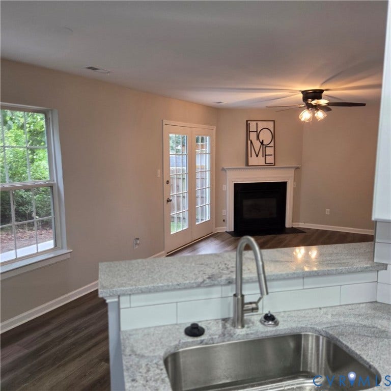 3241 Ransom Hills Road, Chesterfield, VA 23237 Kitchen bar with speckled countertop and stainless steel sink