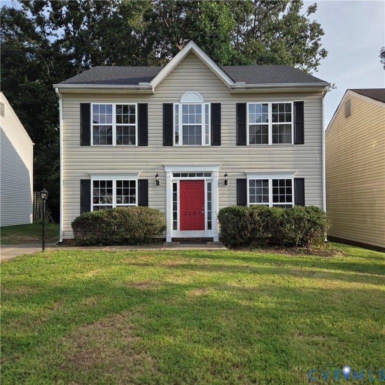 3241 Ransom Hills Road, Chesterfield, VA 23237 Two-story residence featuring light-colored siding, a prominent red front door with white trim, and black louvered shutters