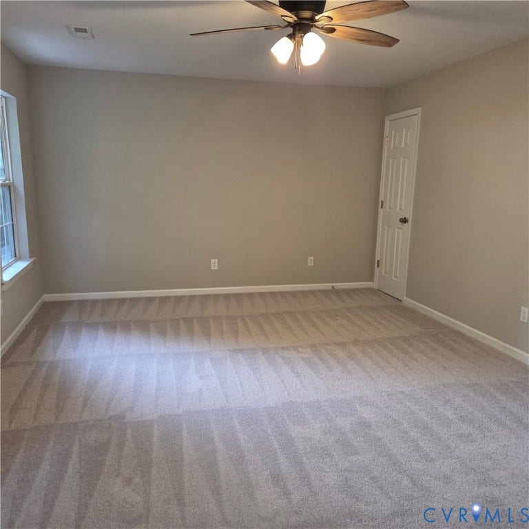 3241 Ransom Hills Road, Chesterfield, VA 23237 Carpeted flooring, neutral wall tones, window with natural light, ceiling fan with integrated lighting