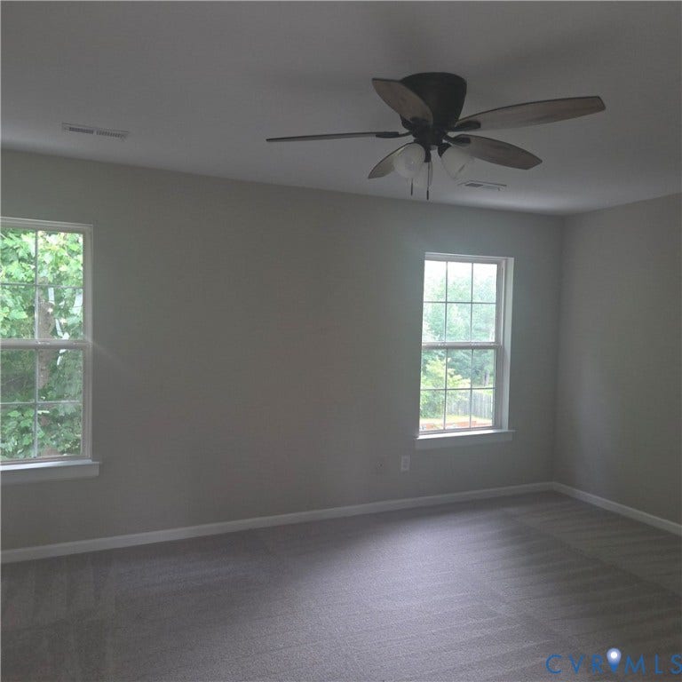 3241 Ransom Hills Road, Chesterfield, VA 23237 Neutral-toned walls complement the gray carpeting