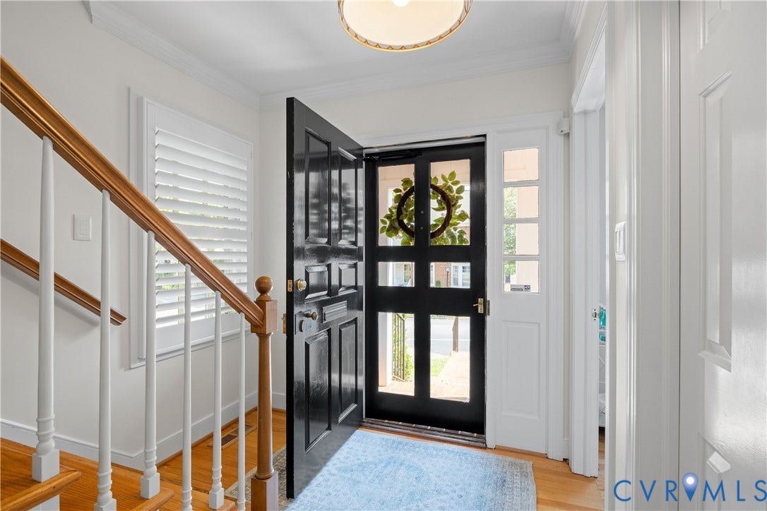 300 N Ridge Road, #97, Henrico, VA 23229 Handsome light-filled entrance with hardwood floors, window with plantation shutters and staircase to the second floor