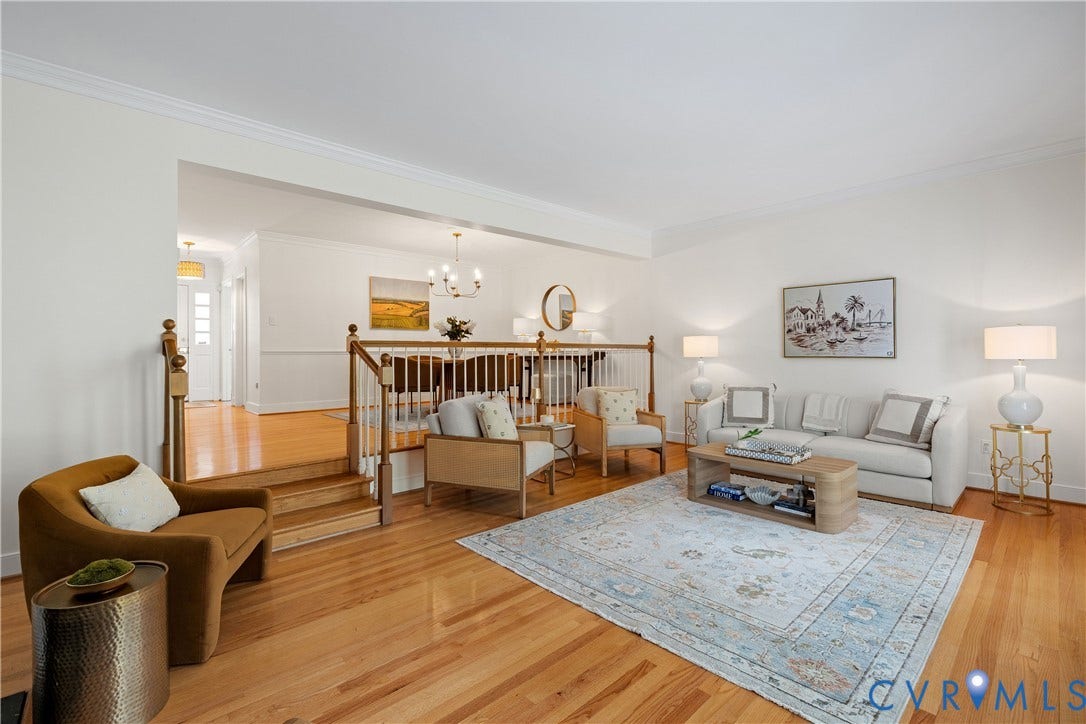 300 N Ridge Road, #97, Henrico, VA 23229 Open-concept living space featuring wood-finish flooring, white walls, and crown molding