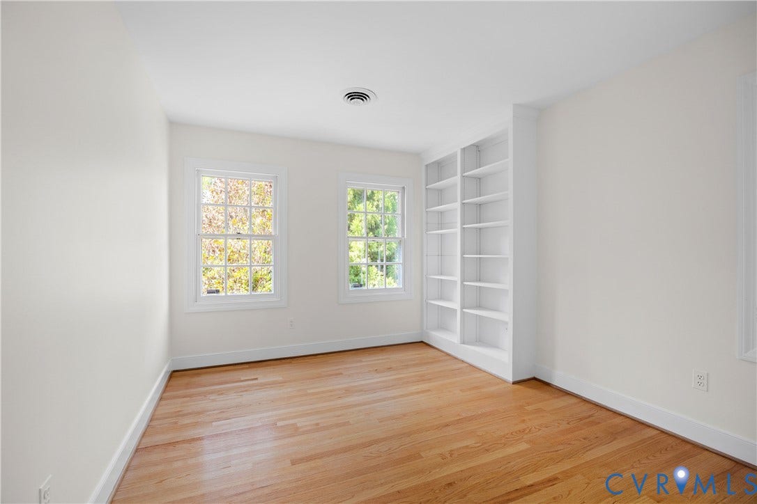 300 N Ridge Road, #97, Henrico, VA 23229 Bedroom two with hardwood floors, built-in display shelves and windows!