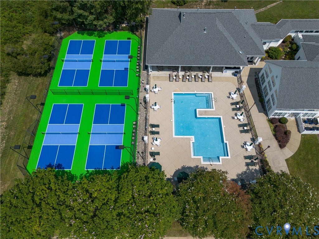 5046 Lewisetta Drive, Carriage Homes II Crossridge, Glen Allen, VA 23060 Multiple pickleball courts, an outdoor swimming pool, and a building with a covered patio are featured amenities
