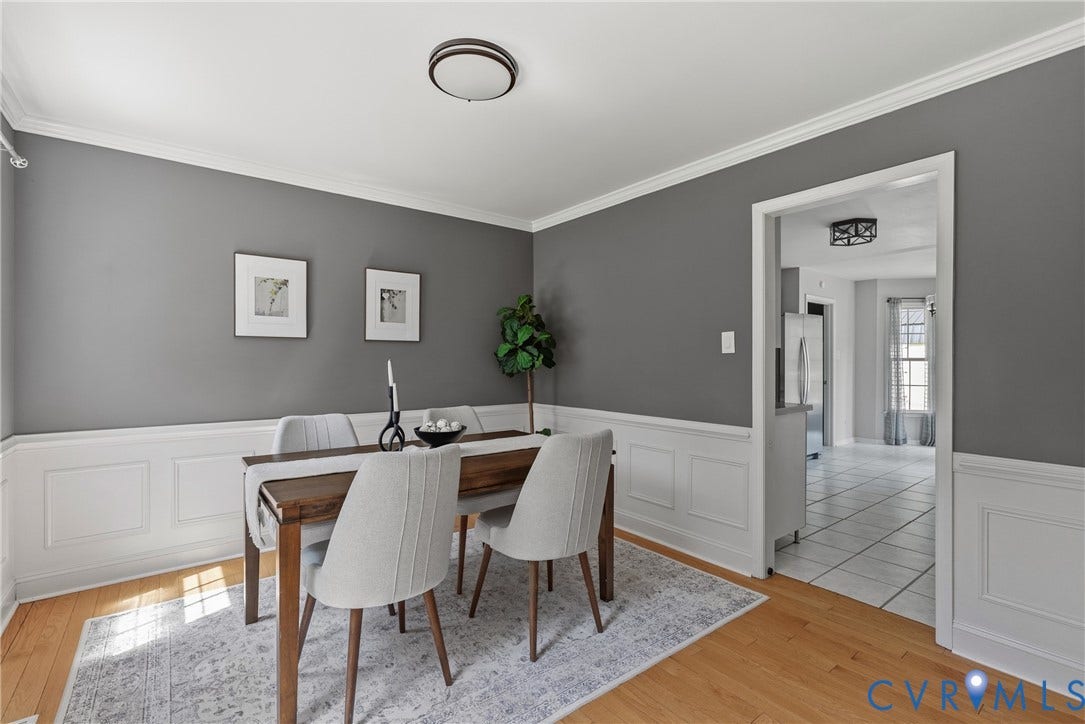 3242 Sherwood Ridge Drive, Powhatan, VA 23139 Hardwood flooring, crown molding, chair rail molding, recessed wall panels, and an overhead flush-mount light fixture