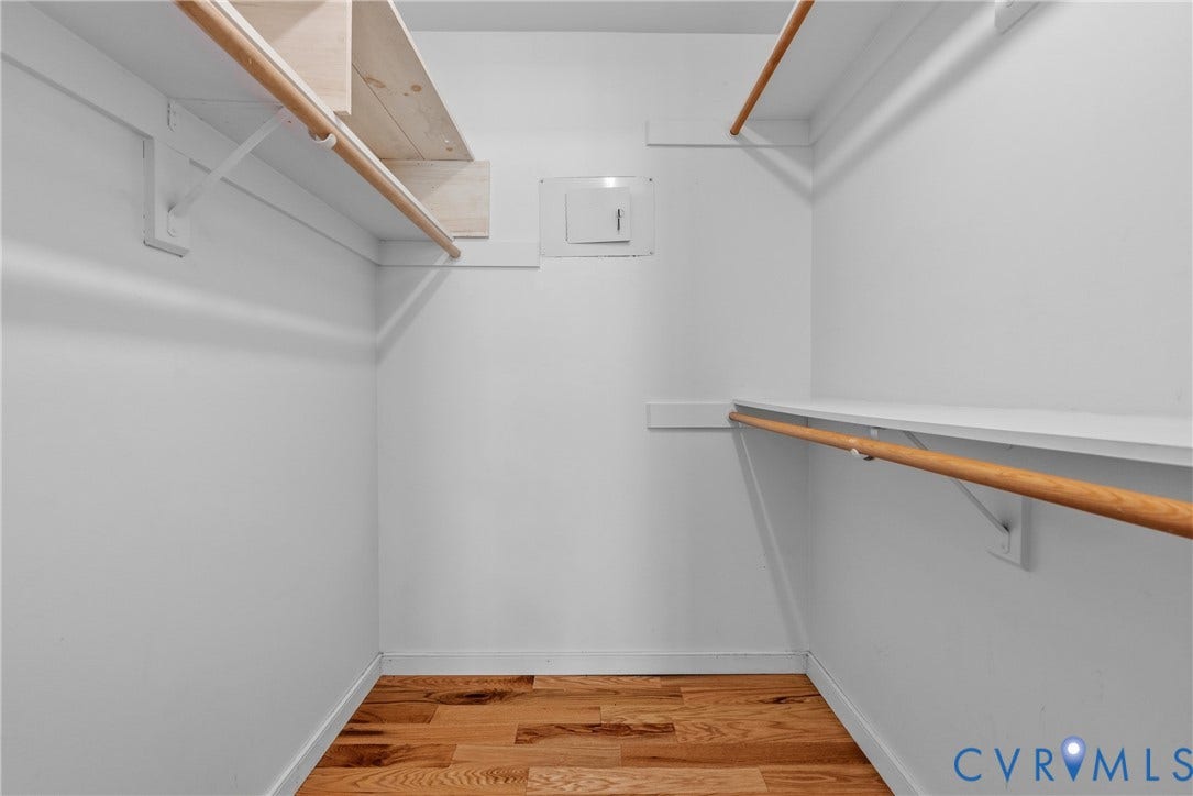 3242 Sherwood Ridge Drive, Powhatan, VA 23139 White-painted walls with wood-finish flooring