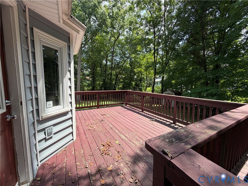 4603 Edenton Place, Greenbriar, Chester, VA 23831 Expansive wooden deck with coordinating railings, featuring a bay window on the exterior wall