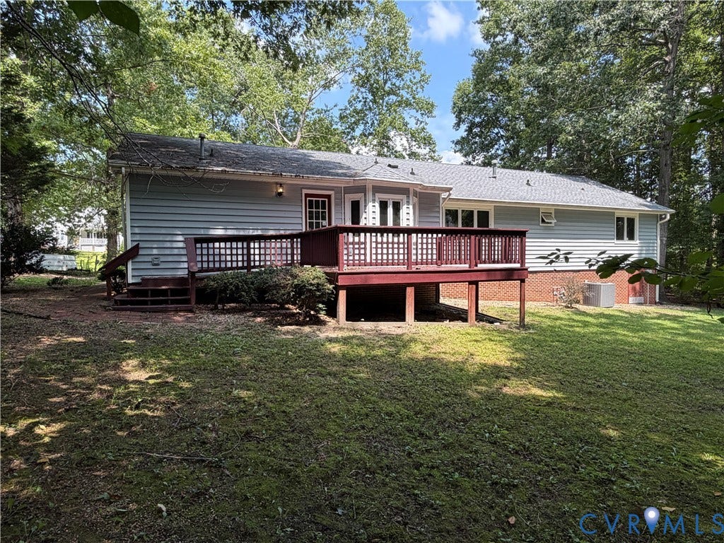 4603 Edenton Place, Greenbriar, Chester, VA 23831 Expansive rear deck with lattice railing, a shingle roof, and light-colored siding