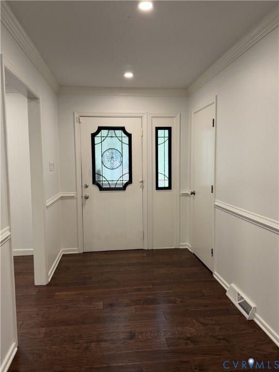4603 Edenton Place, Greenbriar, Chester, VA 23831 Wood-finish flooring, recessed lighting, white crown molding, decorative glass panel entry door, and a matching sidelight
