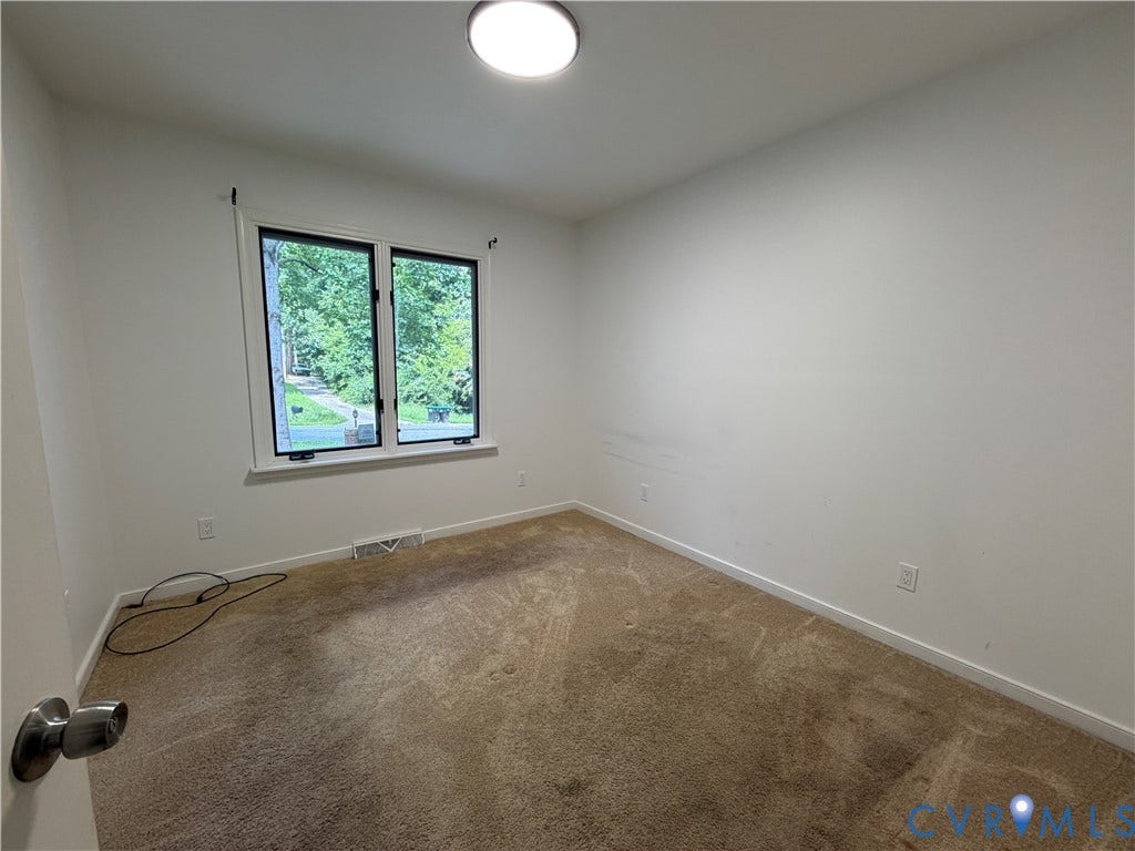 4603 Edenton Place, Greenbriar, Chester, VA 23831 Recessed ceiling lighting, white painted walls, and window with white trim