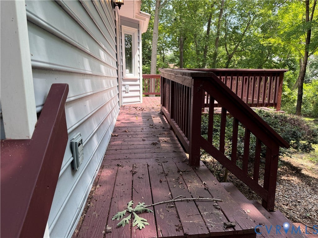 4603 Edenton Place, Greenbriar, Chester, VA 23831 Wood deck with a built-in railing system, featuring stairs and a bay window