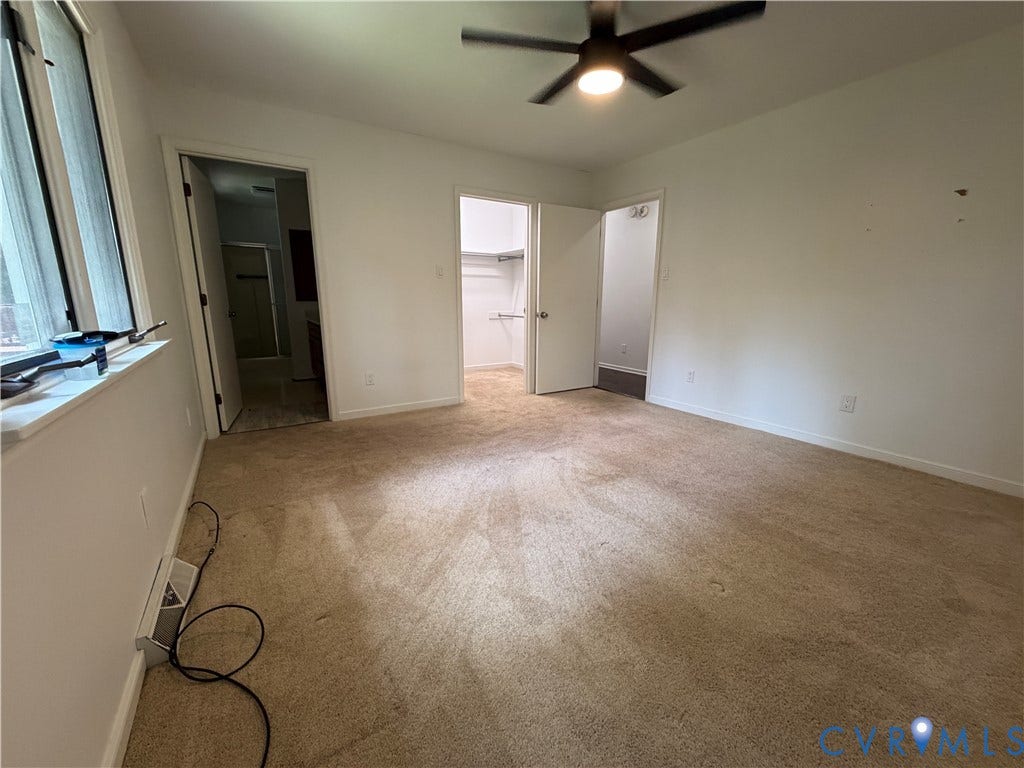 4603 Edenton Place, Greenbriar, Chester, VA 23831 Carpeted interior space with a ceiling fan, window, and multiple doorways