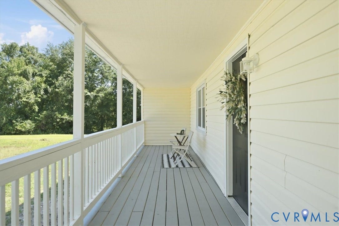 16111 Walkers Mill Road, Stony Creek, VA 23832 Covered porch with painted wood-finish flooring, white siding, and white railing
