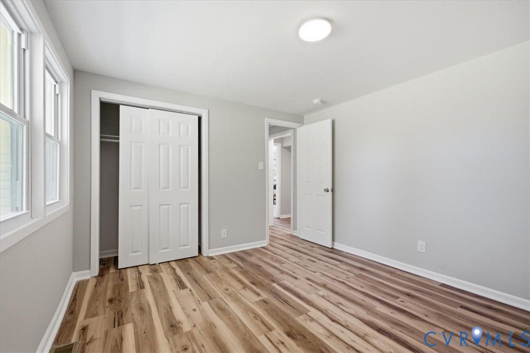 16111 Walkers Mill Road, Stony Creek, VA 23832 Wood-finish flooring, white trim, recessed lighting, and a bi-fold closet