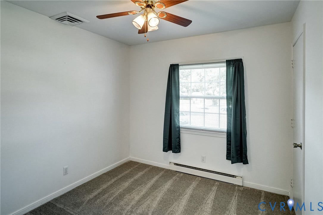 10104 Terry Court, Henrico, VA 23228 Wall-to-wall carpet flooring, ceiling fan with integrated lighting, and a single window with blinds