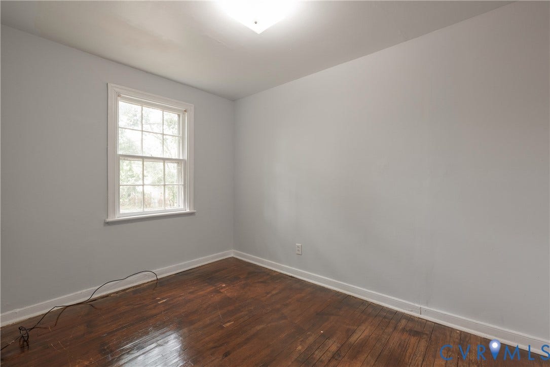 1704 Westhill Road, Richmond, VA 23226 Bedroom #3 Hardwood flooring, painted walls, window with white trim, and a ceiling-mounted light fixture
