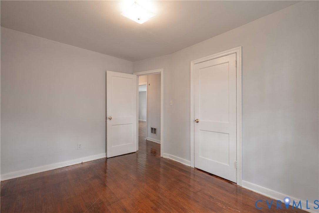 1704 Westhill Road, Richmond, VA 23226 Bedroom #2 with Hardwood-finish flooring, light grey wall paint, and large closet