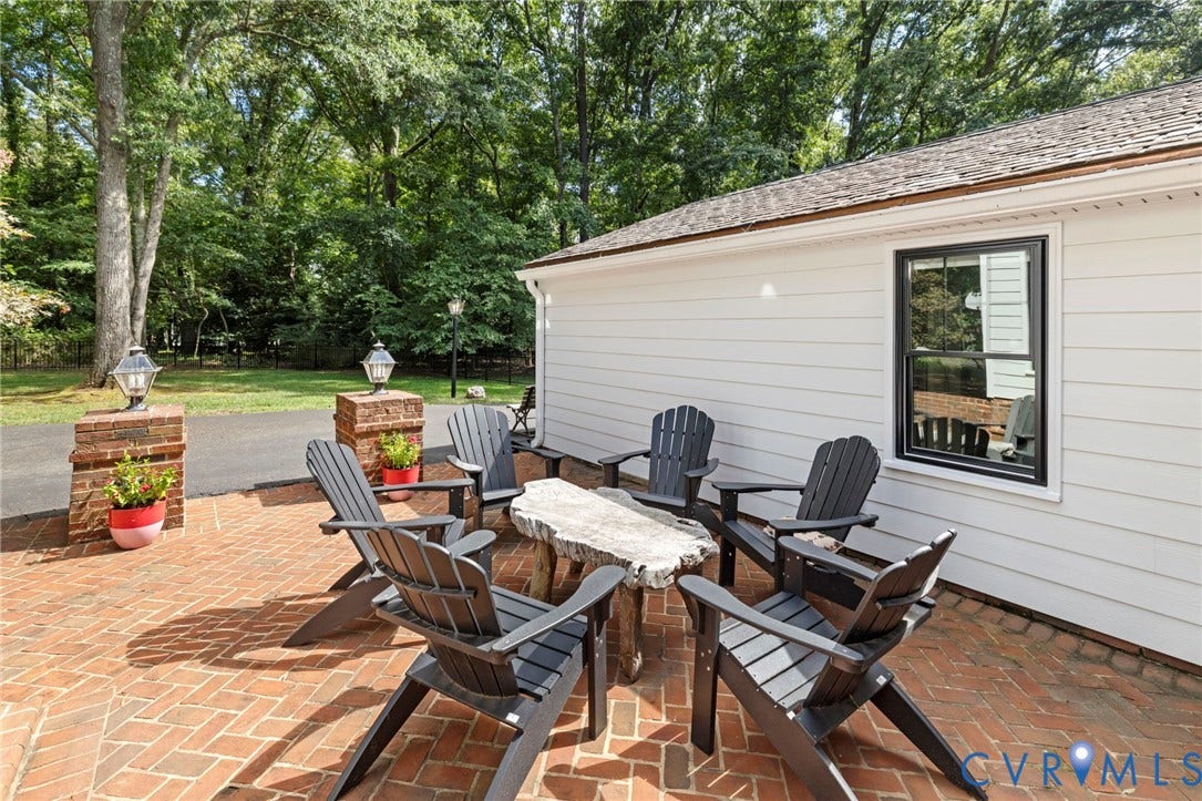 13531 W Salisbury Road, Salisbury, Midlothian, VA 23113 Brick patio with a herringbone pattern, flanked by brick pillars with integrated lighting