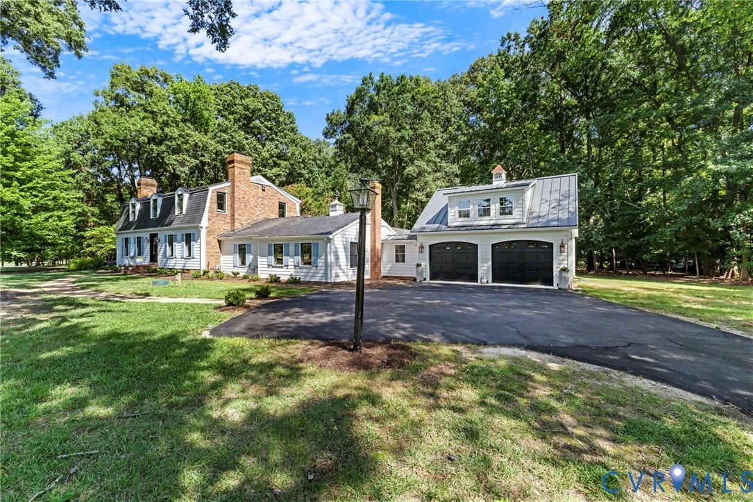 13531 W Salisbury Road, Salisbury, Midlothian, VA 23113 White exterior with light blue window shutters, dormer windows, and a brick chimney