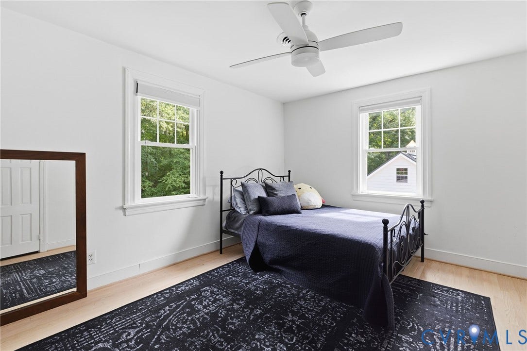 13531 W Salisbury Road, Salisbury, Midlothian, VA 23113 Hardwood-style flooring, white walls, two double-hung windows, and an overhead ceiling fan